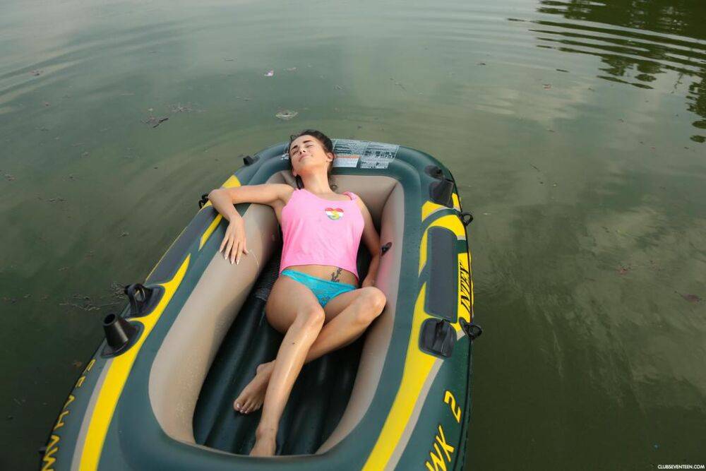 European teen with a flawless body relaxes in a small boat rubbing her snatch - #7