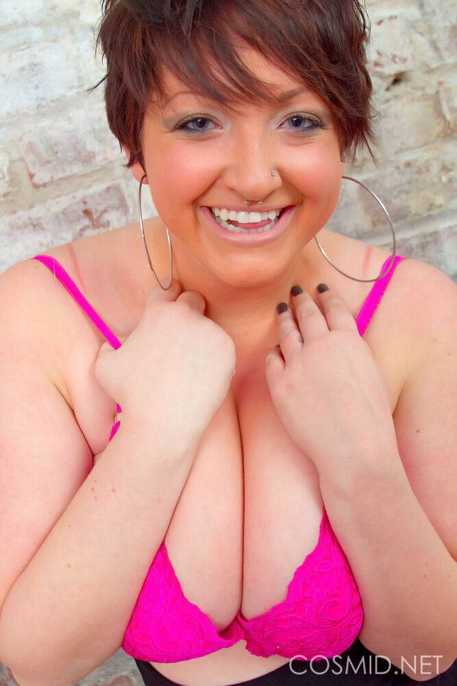 Thick amateur girl Lainey covers her naked tits with her hands by a brick wall - #9