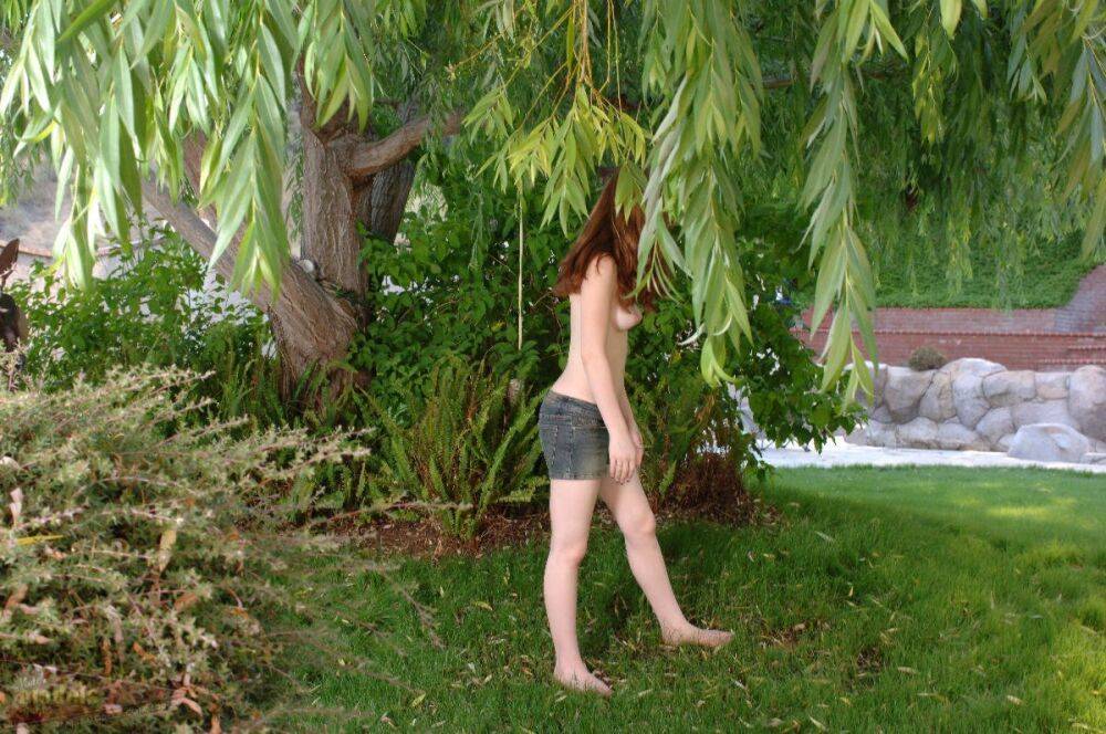 Redhead amateur Ruby Flame touts her bald twat after getting naked in a yard - #8