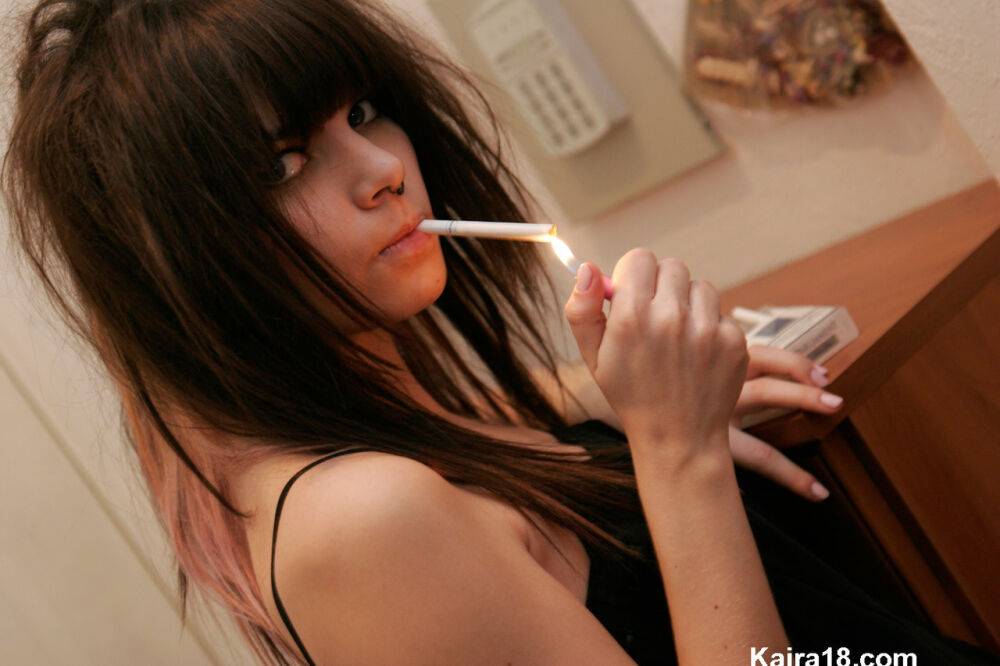 Skinny teen Kaira 18 smokes a cigarette before stripping naked - #14