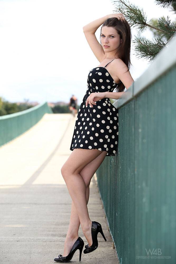 Solo girl removes her polka dot dress while out for a walk in public - #5