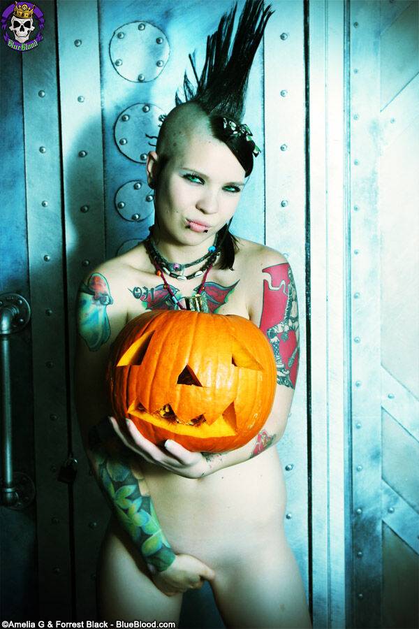 Alternative girl Tara Toxic carves a pumpkin in thigh highs and boots - #3