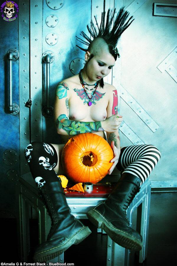 Alternative girl Tara Toxic carves a pumpkin in thigh highs and boots - #14