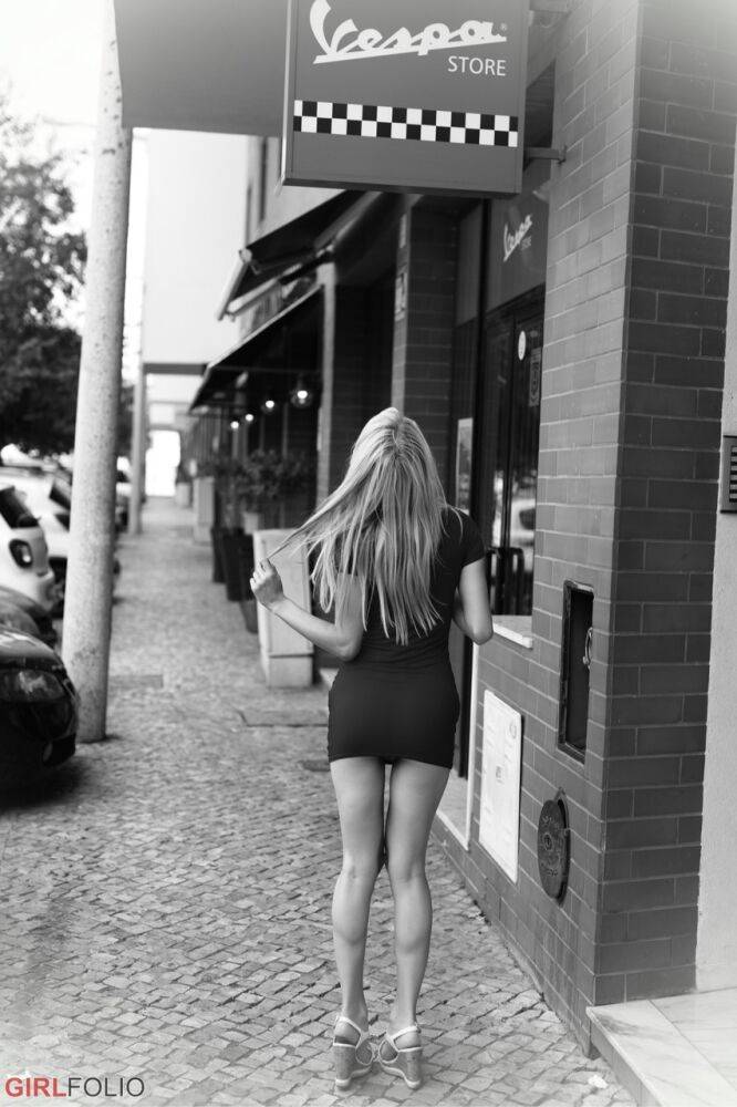 Thin blond chick Chloe Toy enjoys a smoke as she goes about her daily business - #8