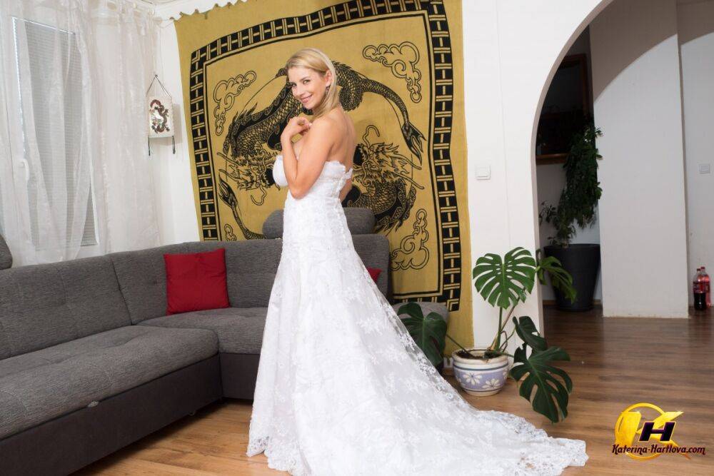 Sexy blond Katerina Hartlova oils her hooters before toying in a wedding dress - #9