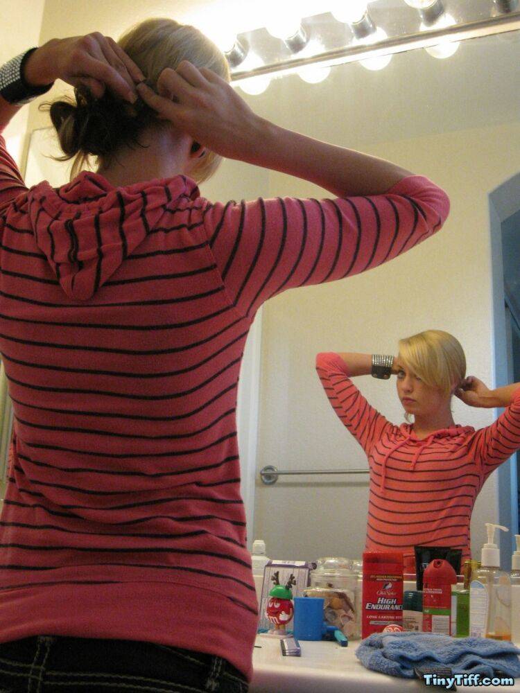 Blonde amateur Tiny Tiff sports a whale tail while doing her hair in a mirror - #4