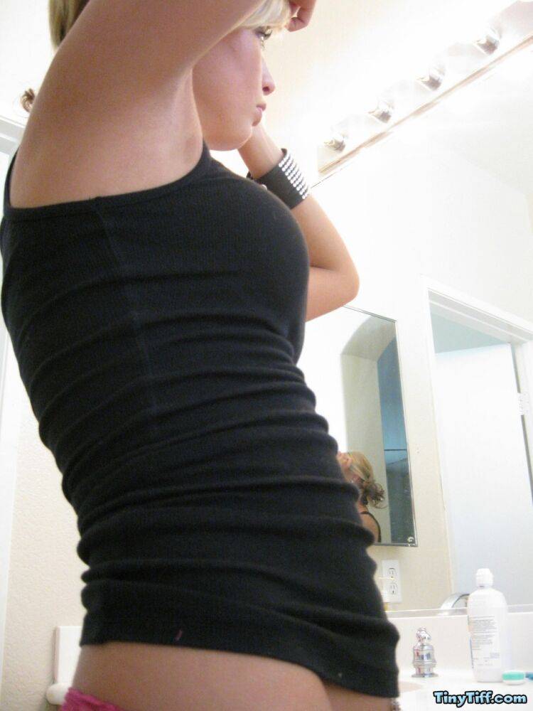 Blonde amateur Tiny Tiff sports a whale tail while doing her hair in a mirror - #7