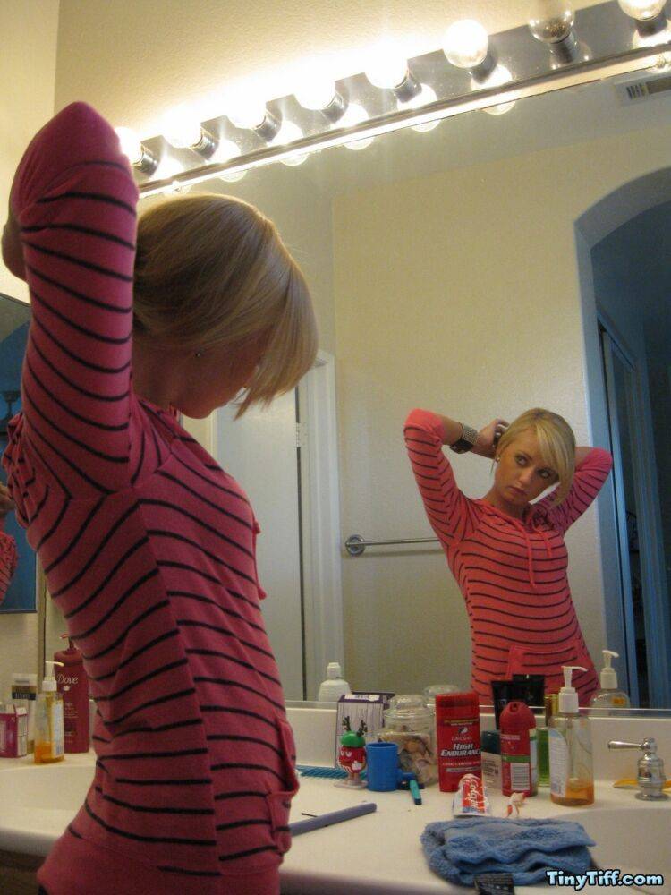 Blonde amateur Tiny Tiff sports a whale tail while doing her hair in a mirror - #5