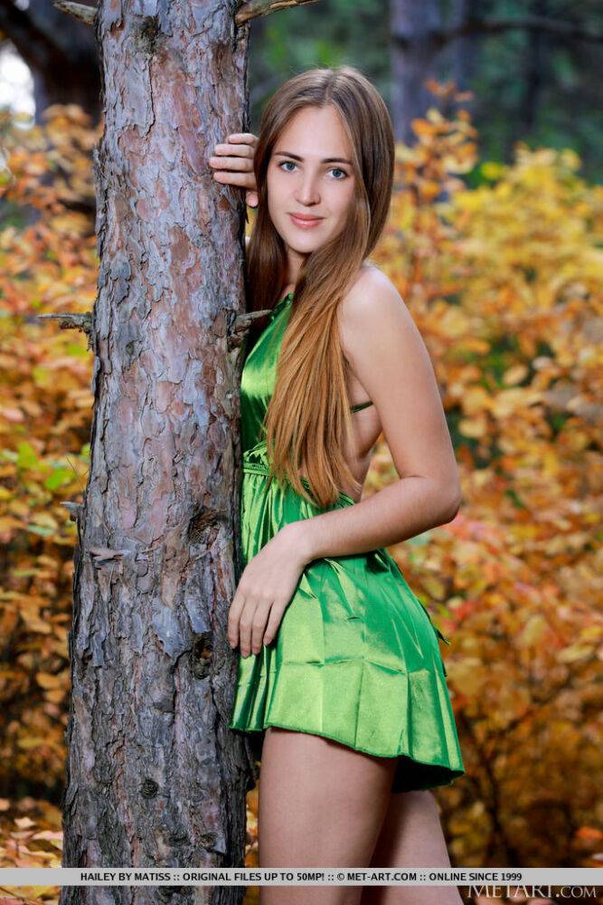 Teen model Hailey slips off a green dress to pose bare naked in a forest - #14