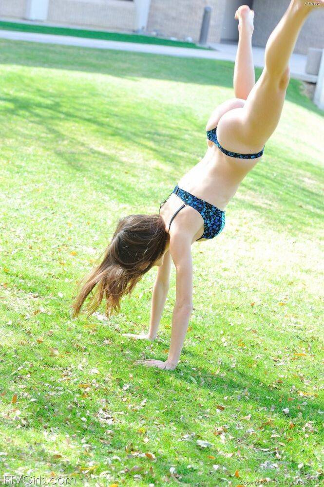 Caucasian teen gets completely naked before showing her flexibility on a lawn - #8