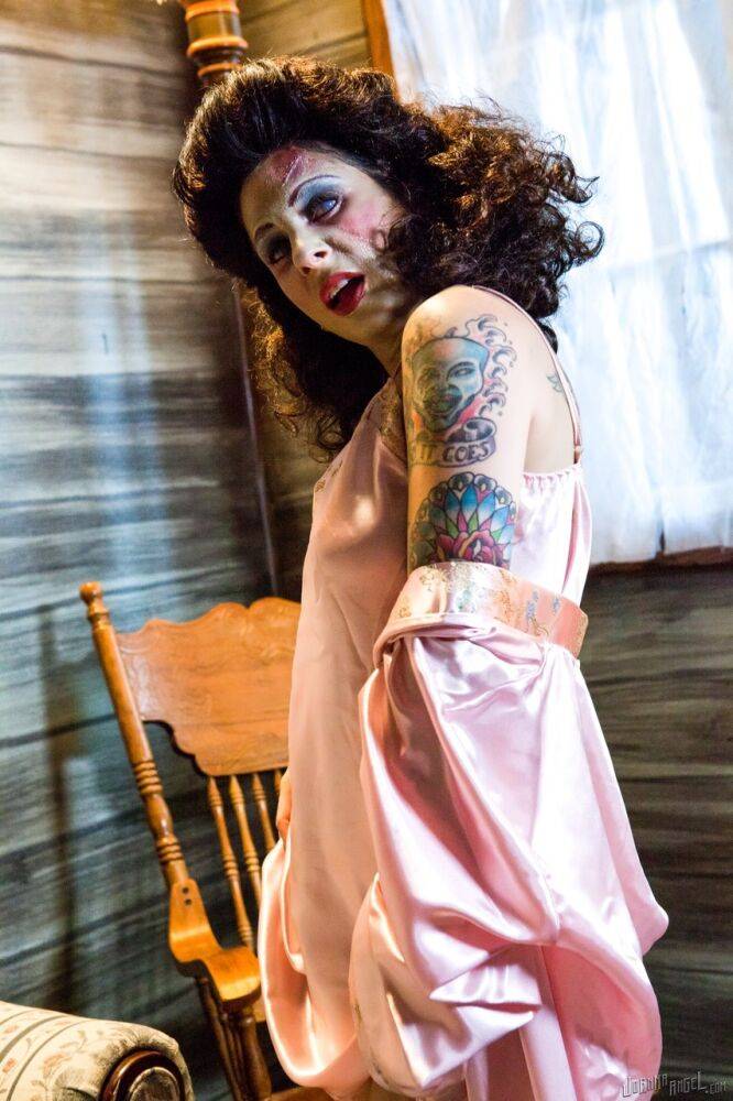 Inked chick Joanna Angel exposes her tits while taken over by a Zombie - #8