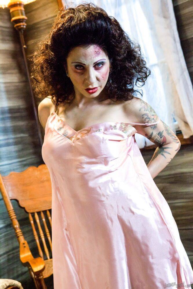 Inked chick Joanna Angel exposes her tits while taken over by a Zombie - #2