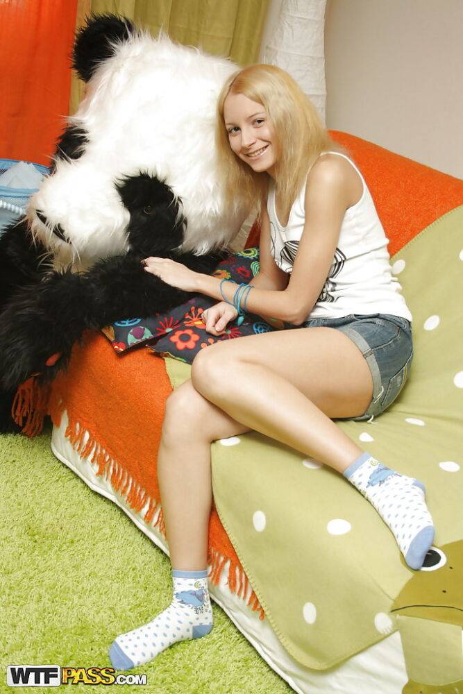 Sweet teenage blonde enjoys a hardcore play with her panda toy - #7