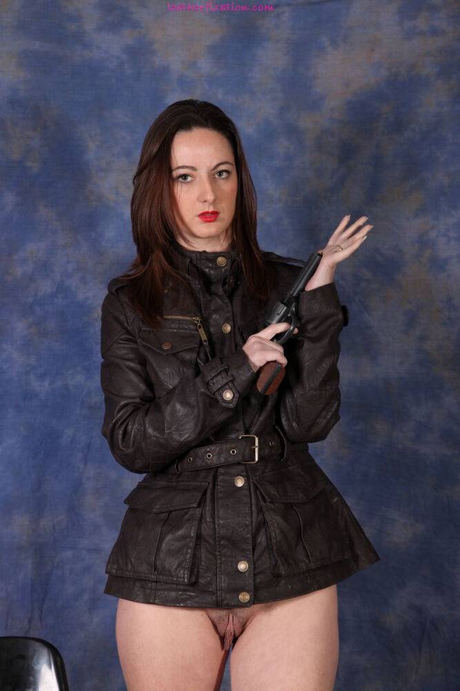 Brunette chick removes a leather coat to go naked in black pumps - #2