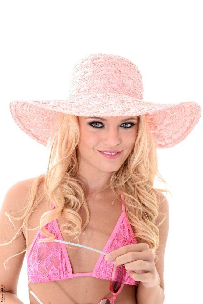 Cute blonde Vanda Lust takes off a sun hat and bikini to pose nude in shades - #6