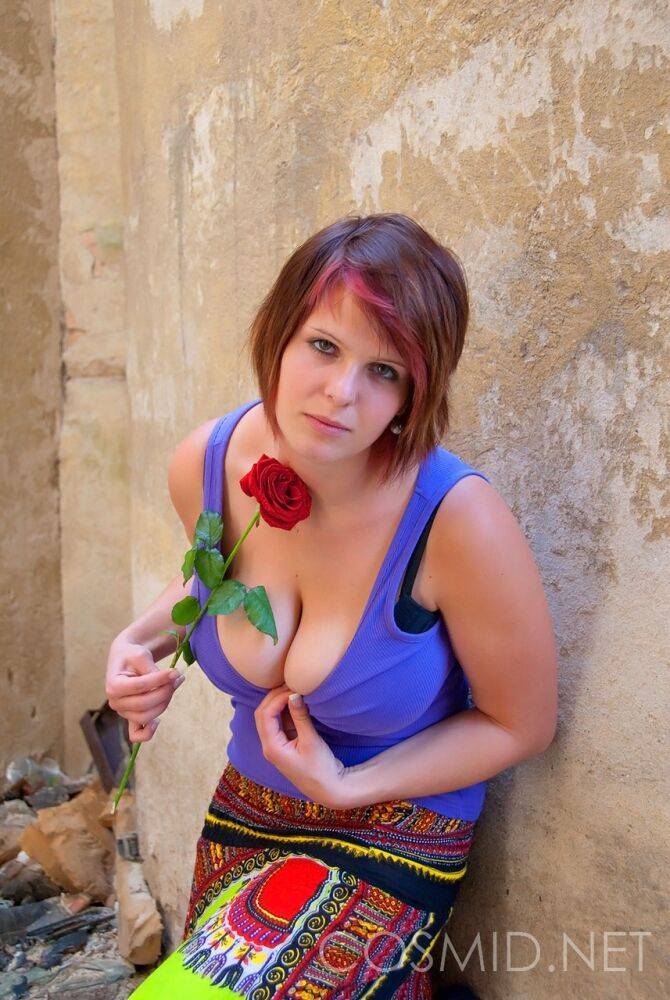 Amateur BBW Nika holds a red rose while showing ample cleavage in a bra - #15