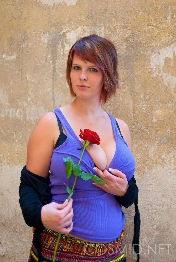 Amateur BBW Nika holds a red rose while showing ample cleavage in a bra - #2