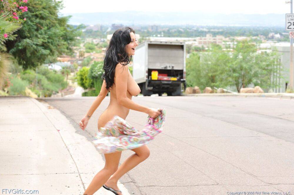 Naughty chick with dark hair runs across a busy road in the nude - #12