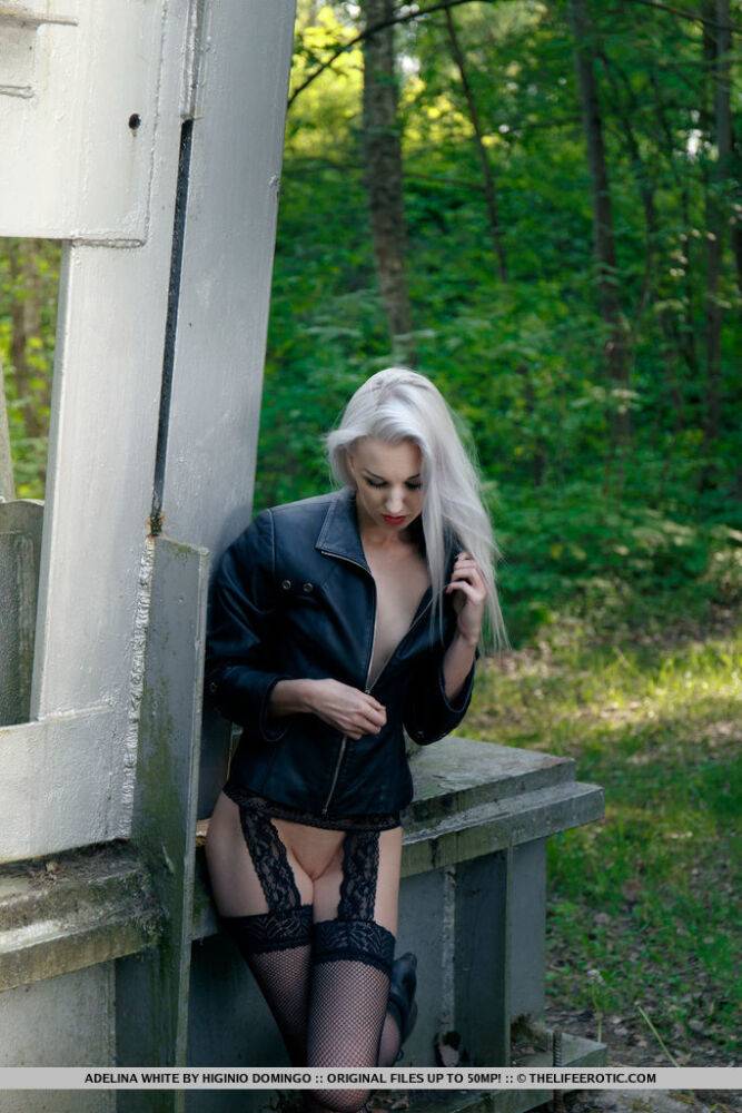 European teen Adelina White takes a pee on trestle bridge in black stockings - #11