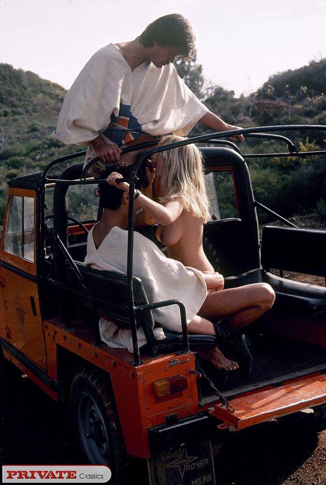 Retro pornstar bangs a couple of guys out for ride in bush in a Jeep - #12