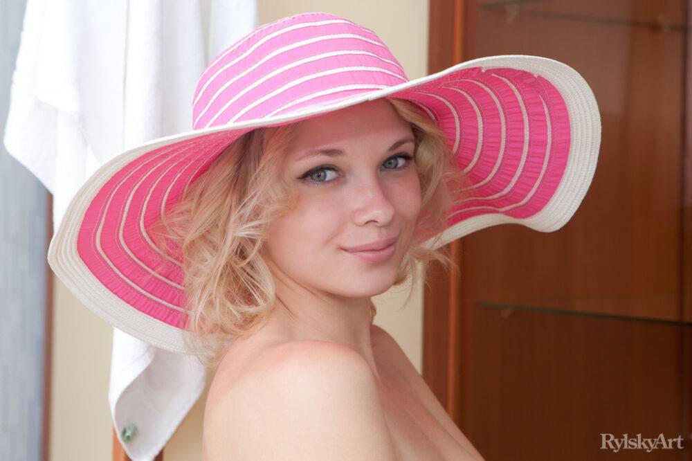 Adorable blonde teen Feeona strikes great nude poses in a wide-brimmed sun hat - #15