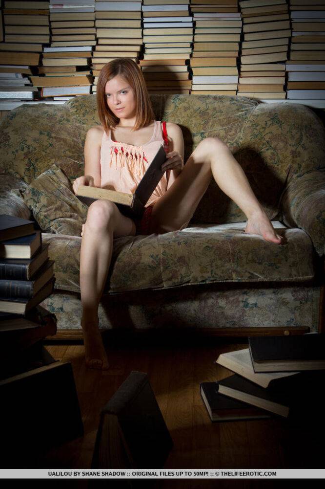 Hot horny teen Ualilou masturbating her naked pussy on a pile of books - #10