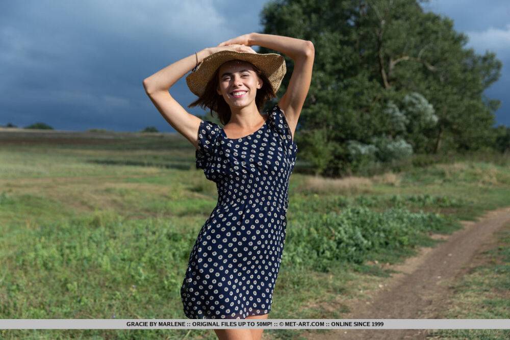 Skinny teen Gracie removes polka-dot dress to model naked in a field - #7