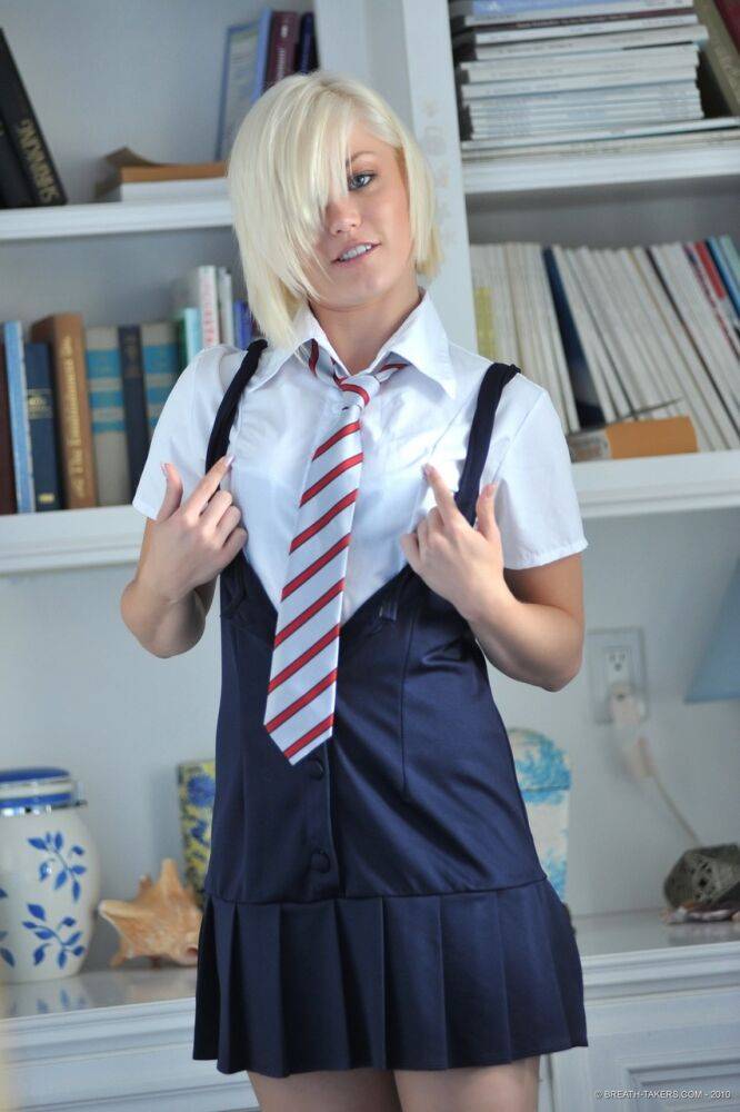 Blonde schoolgirl Ash strips to a necktie while changing school clothes - #1