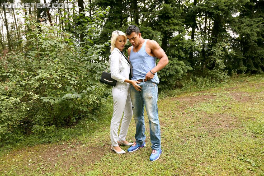 Clothed blonde out for a walk finds herself a cock that needs a blowjob - #5