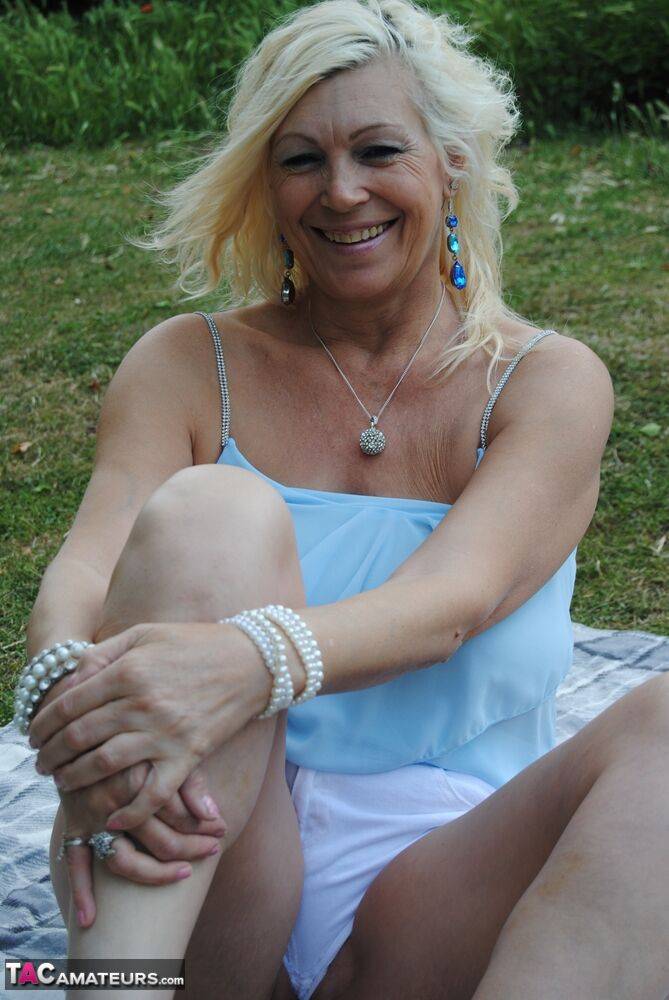 Hot mature Platinum Blonde flashes a hot panty upskirt on a park bench - #8