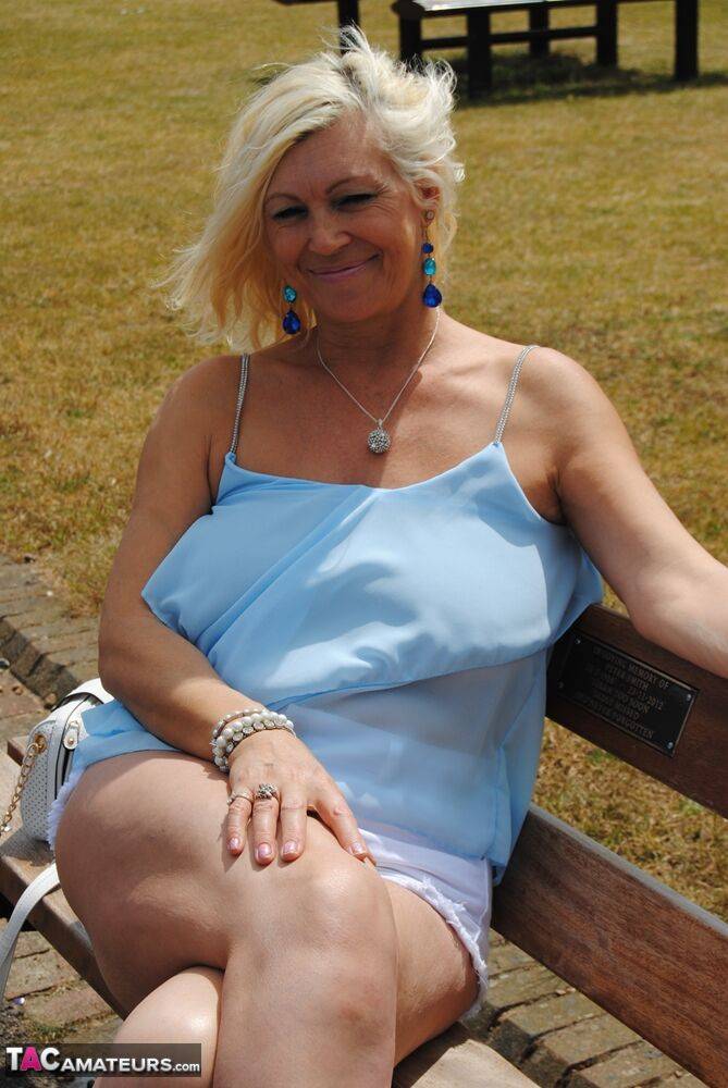 Hot mature Platinum Blonde flashes a hot panty upskirt on a park bench - #4