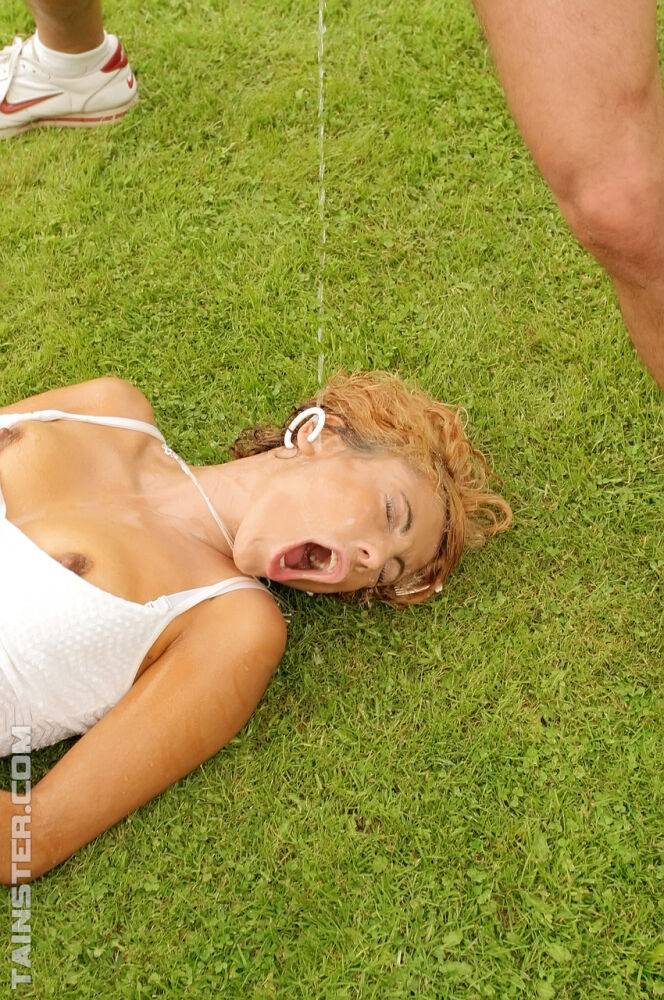 Clothed chick takes a pee and gets pissed on after MMF sex out on the lawn - #5