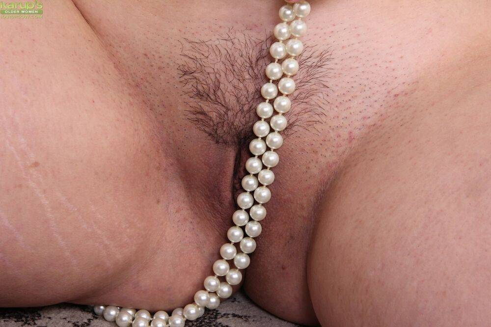 Beautiful older woman Nyla Parker shows her trimmed muff in a strand of pearls - #6