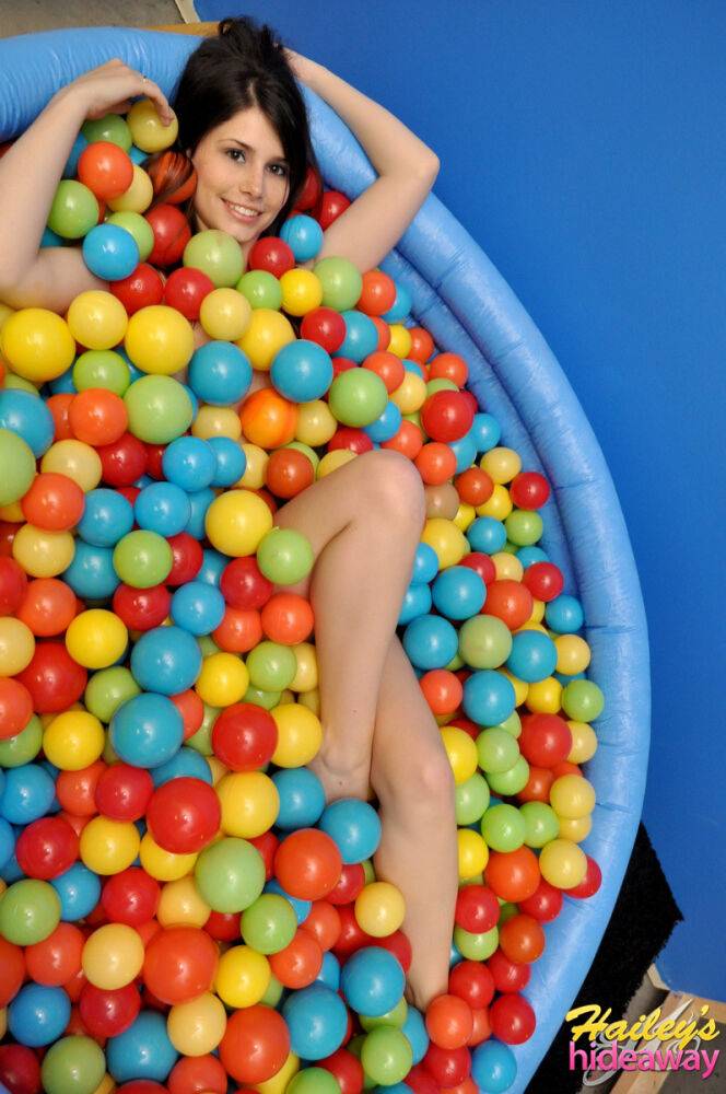 Cute teen Hailey immerses herself in a wading pool filed with balls - #2