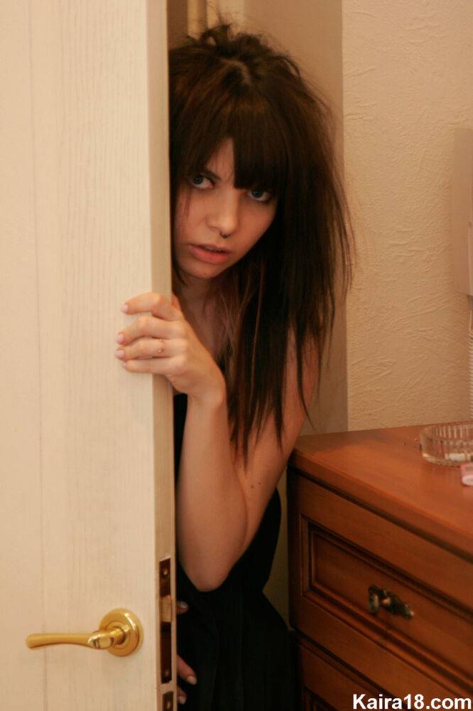 Petite teen Kaira 18 smokes a cigarette while getting naked in her bedroom - #11