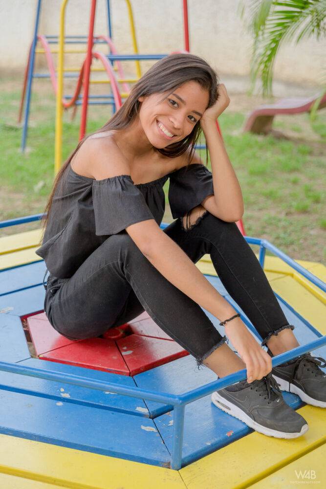 Smiley hot glamour girl Karin Torres looking sexy in ripped jeans on a swing - #8