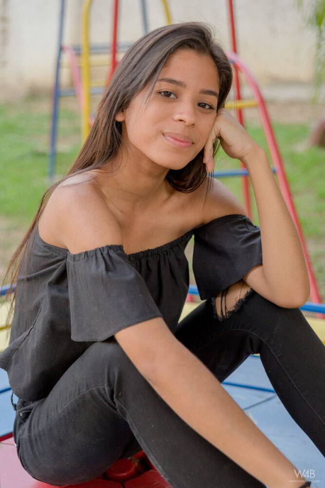 Smiley hot glamour girl Karin Torres looking sexy in ripped jeans on a swing - #4