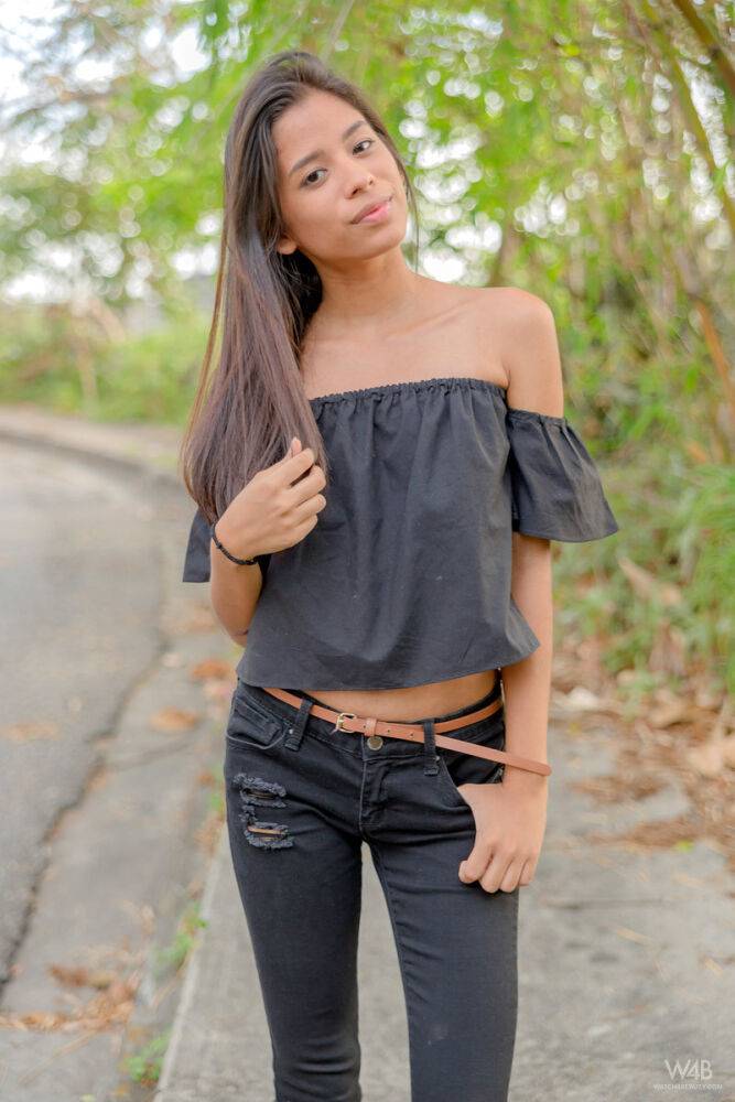 Smiley hot glamour girl Karin Torres looking sexy in ripped jeans on a swing - #13