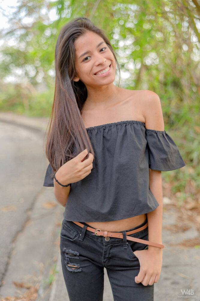 Smiley hot glamour girl Karin Torres looking sexy in ripped jeans on a swing - #16