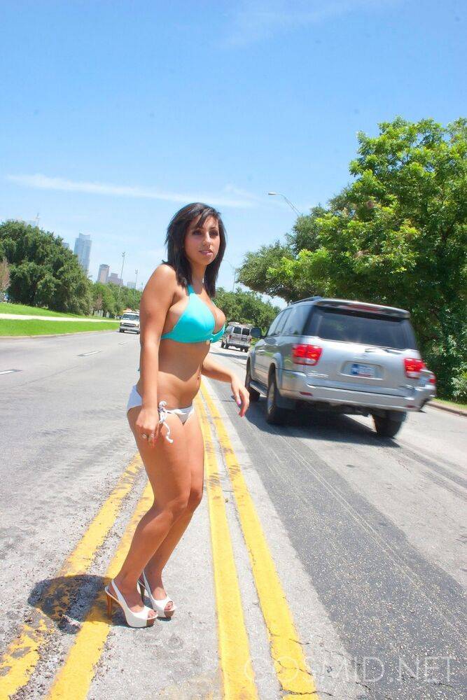 Brunette amateur Shami Halil models a bikini in the middle of a busy road - #7