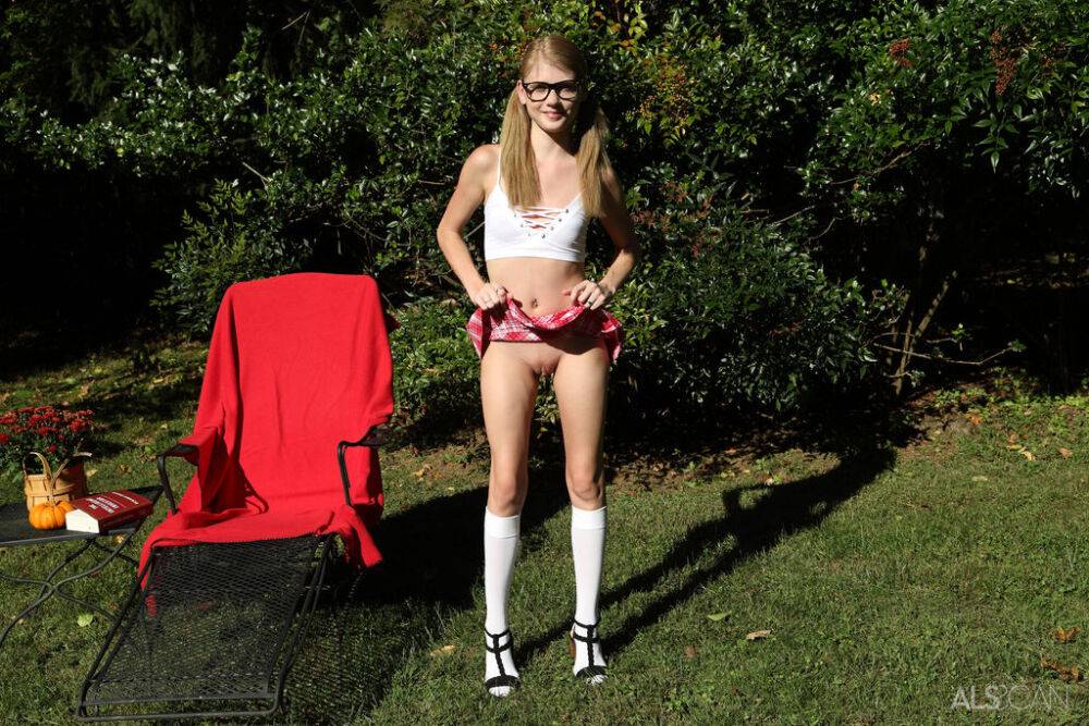 Kinky nerd Hannah Hays works a massive dildo into her twat in the yard - #11