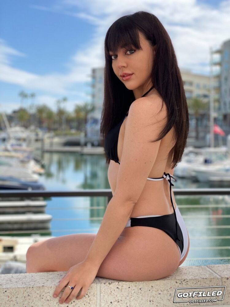 Brunette girl Whitney Wright models a bikini at a marina before having sex - #3