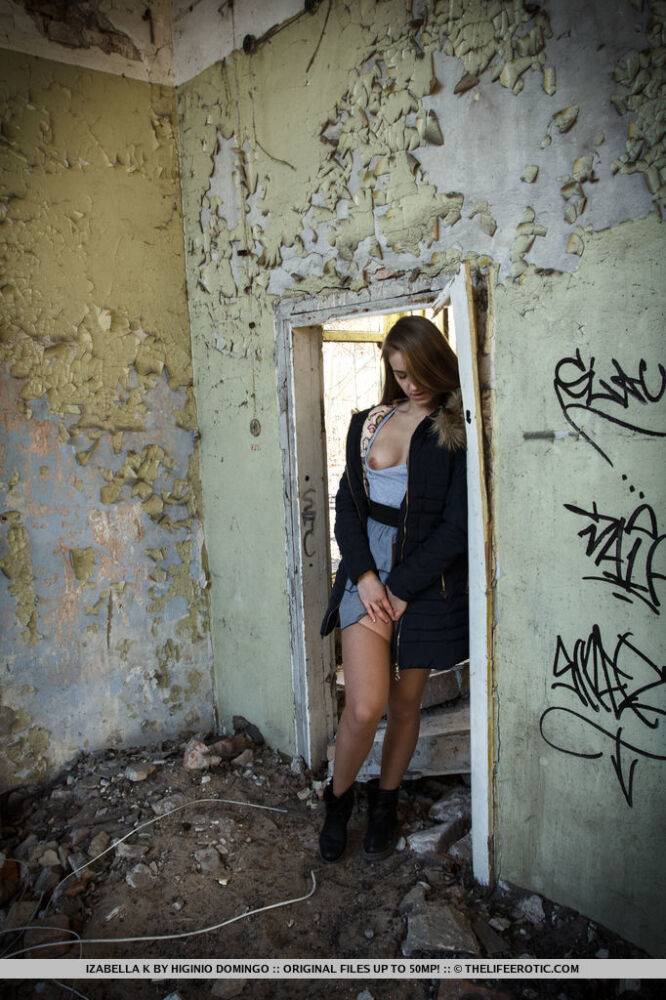 Teen model Izabella K parts her slit and bares her tits in a ruined building - #12