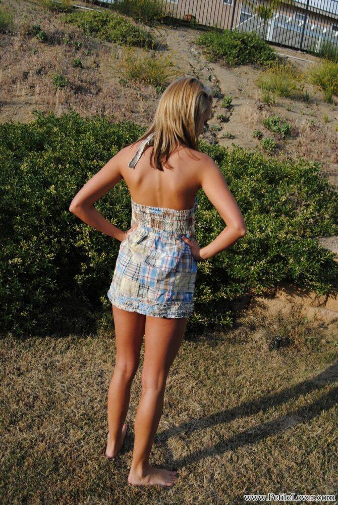 Blonde amateur Tiff stands naked in a yard while showing her cute butt - #2