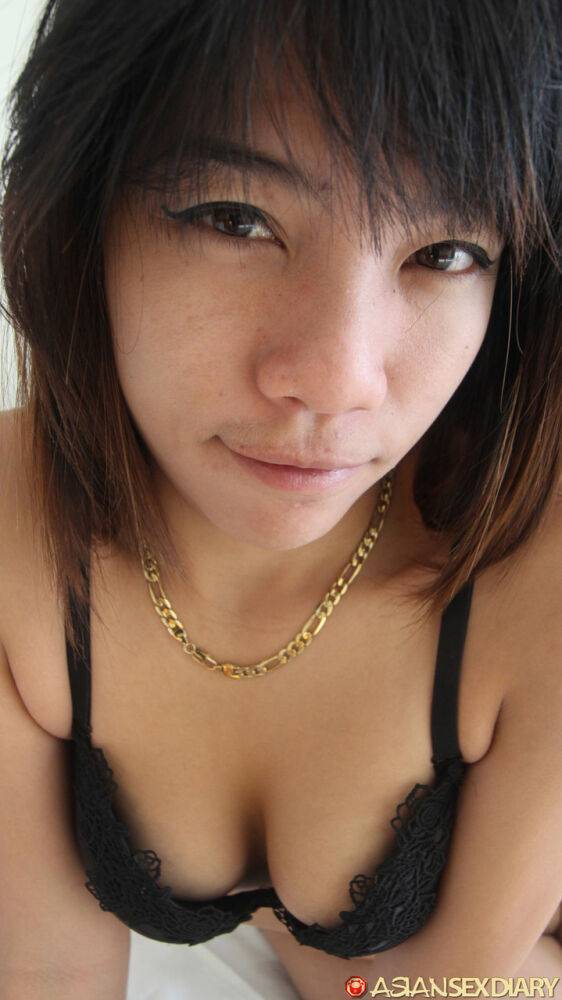 Young Asian girl Lexi makes her debut on a bed during POV action - #8