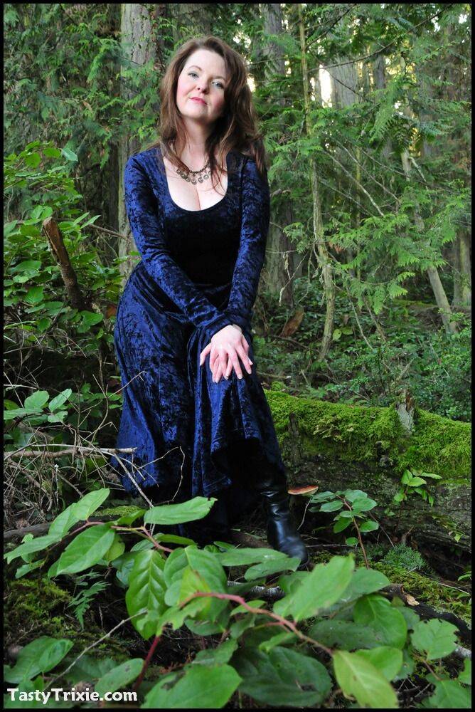 Mature woman Tasty Trixie heads into the woods to flash in a long velvet dress - #3