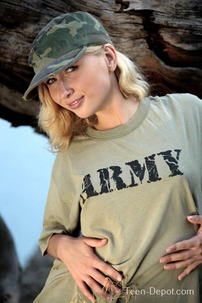 Blonde amateur ditches military attire to pose nude on a dead tree - #3