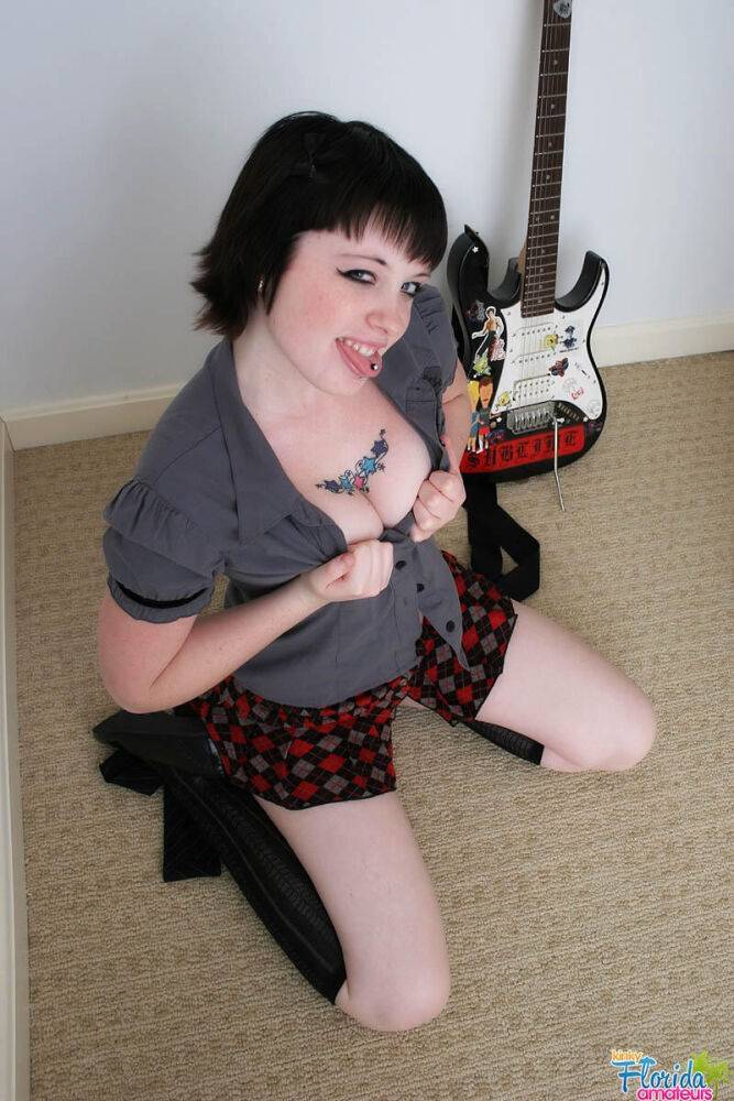 Dark-haired rocker Barbie A exposes her natural tits after upskirt action - #2