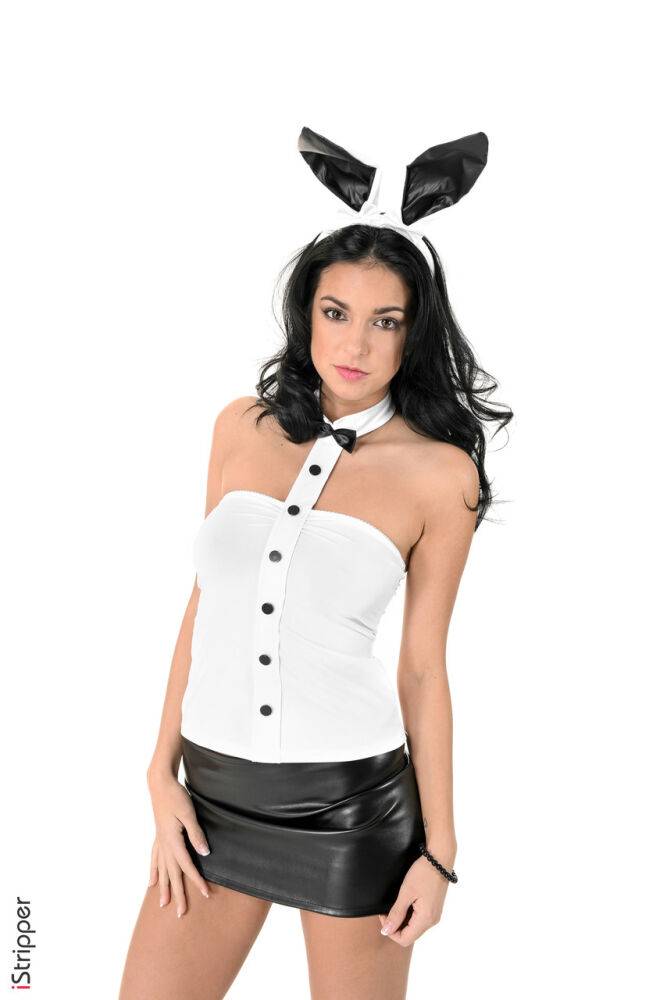 Hot brunette in bunny ears and a short skirt Foxxi Black does a striptease - #8