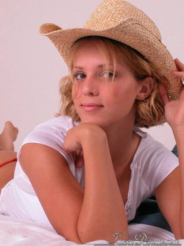 Young blonde Karen covers up her naked breasts with a straw hat in SFW action - #4